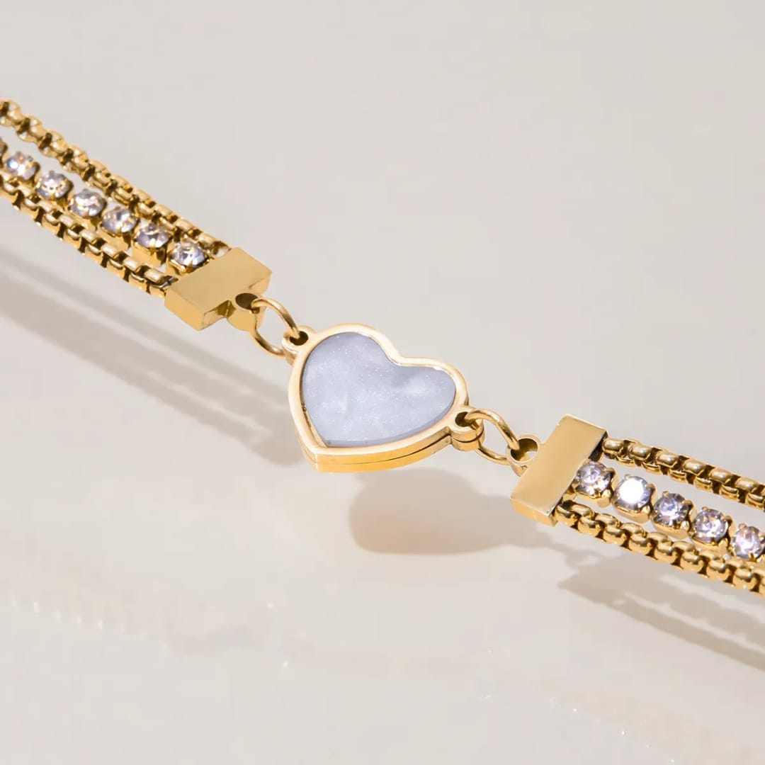 Gold bracelet with heart-shaped