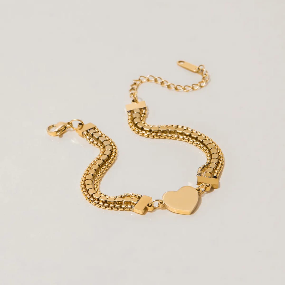 Gold bracelet with heart-shaped
