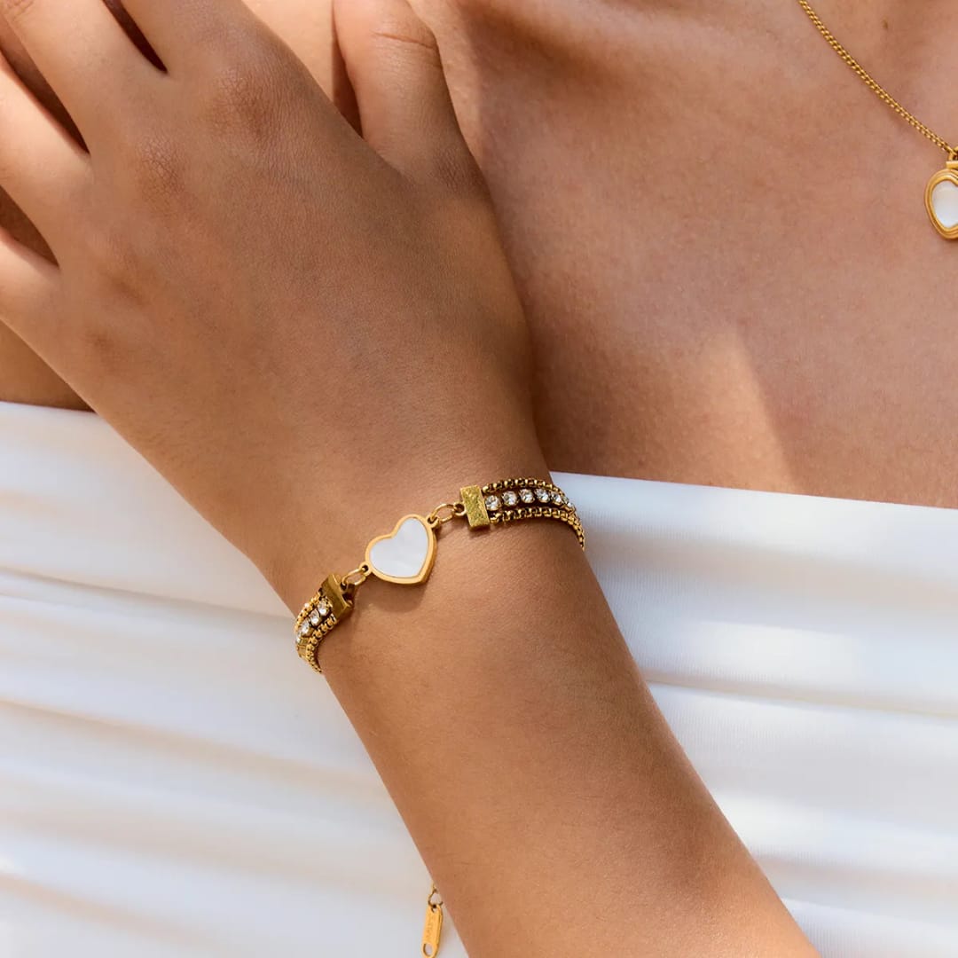 Gold bracelet with heart-shaped
