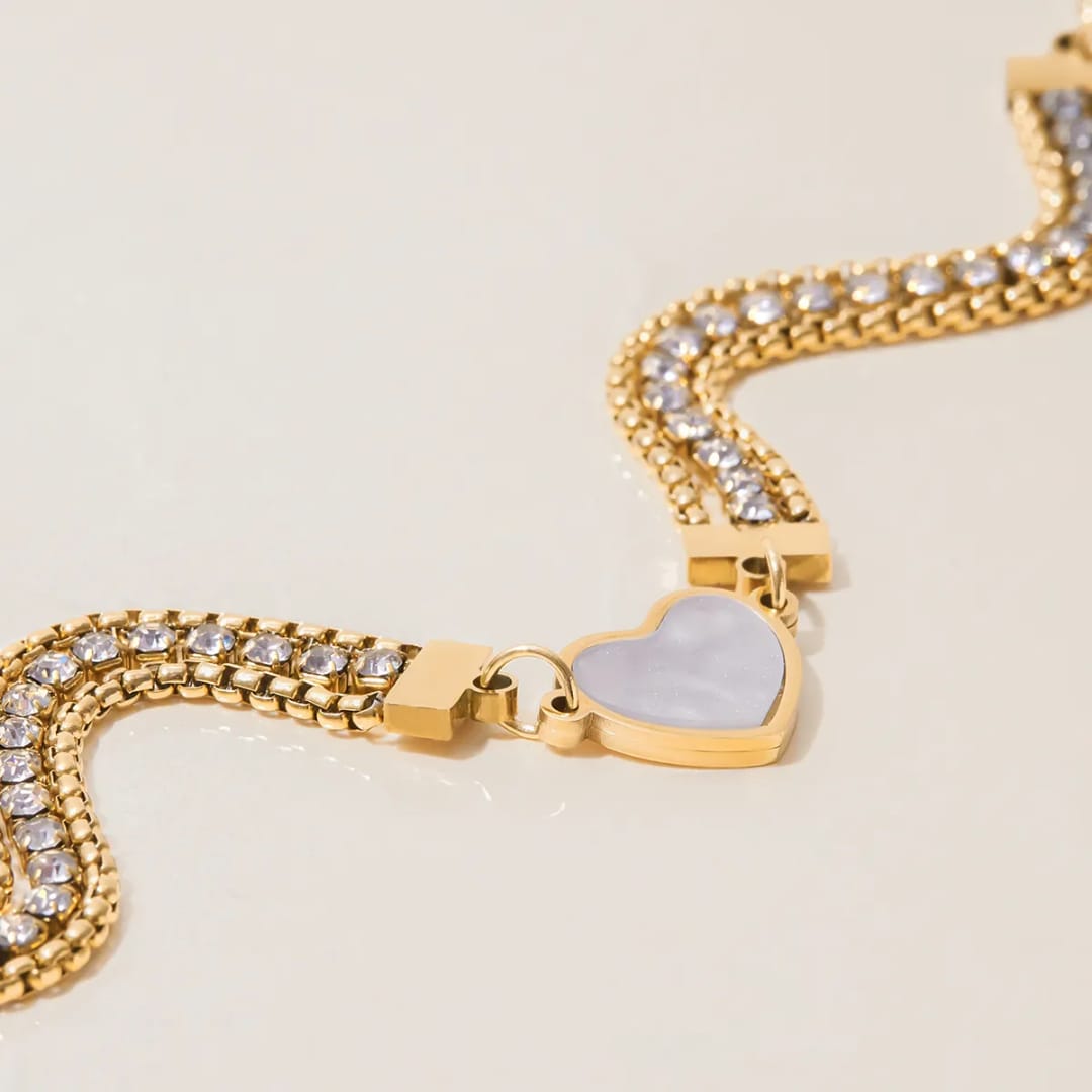 Gold bracelet with heart-shaped