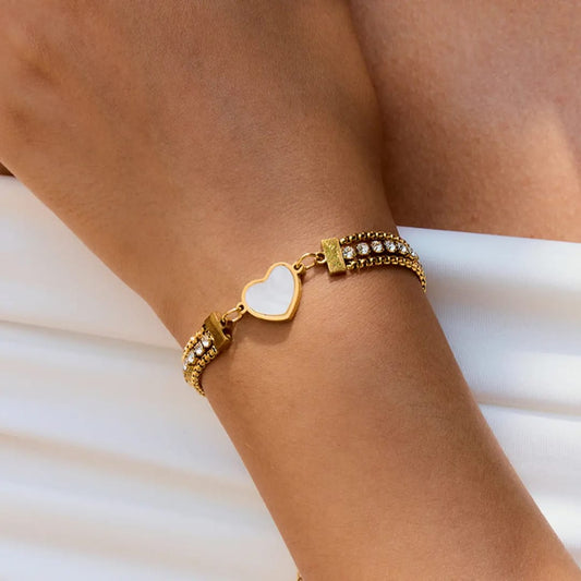 Gold bracelet with heart-shaped